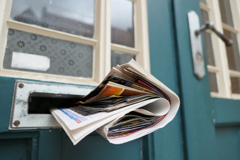 Flyers in a mail slot